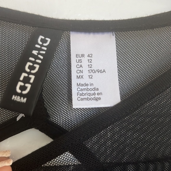 A Black with Floral deco mini dress in Mesh top and sleeves❤️ - Picture 7 of 7